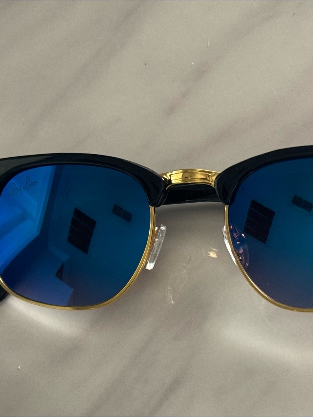 Ray-Ban Black & Gold Clubmaster Sunglasses With Blue Mirror lenses.Sunglass Case